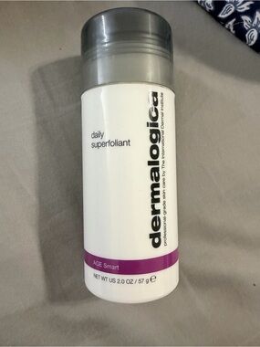 dermalogica White Bottle with Purple Band and Silver Cap